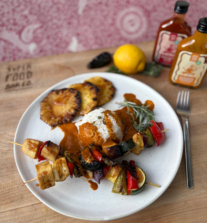 Grilled vegetable skewers with rice and charred pineapple, topped with Superfood Bar Co. Golden Mango Sauce